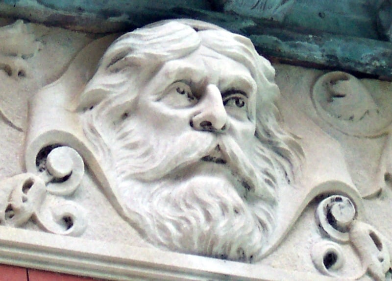 Limestone face of the Prince of India carved into the frieze that surrounds the outside of the Study building