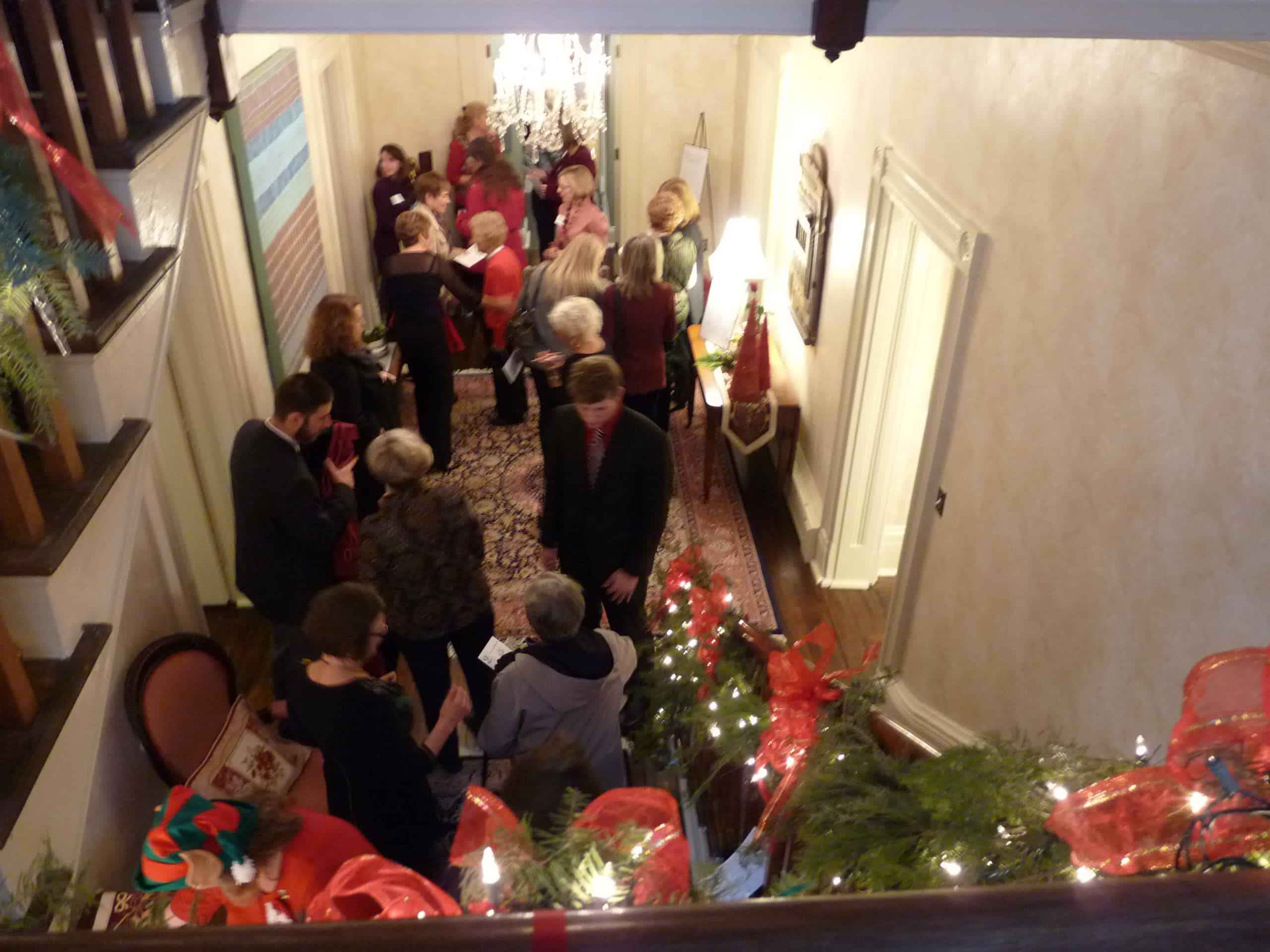 Visitors gather in the foyer of Elston Homestead during the Holiday Tea