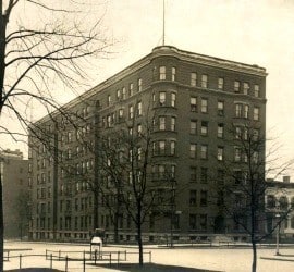 The Blacherne apartment building in Indianapolis; a seven-story brick building with limestone finishes.