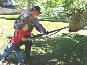 A participant learns to use a bayonet in our Civil War encampment