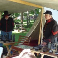 Civil War reenactors in encampment