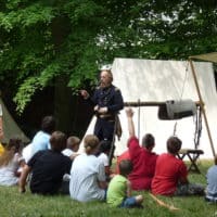 Civil War reenactors in encampment