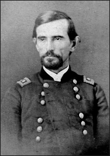 Lew Wallace in military uniform. He has a closely trimmed beard and mustache and dark hair.