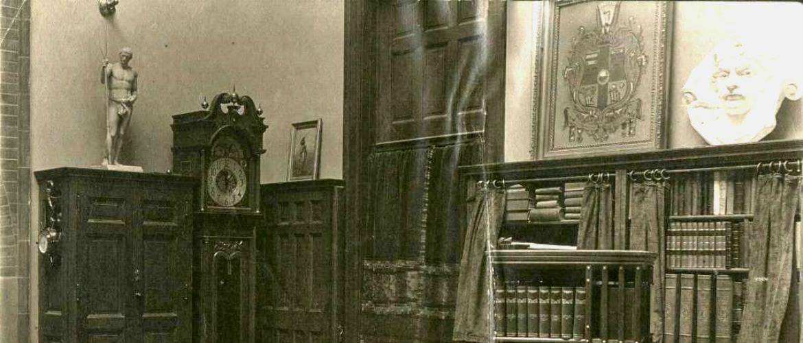 An historic photo of the interior of the Study, casement clock, and Ben-Hur sculpture
