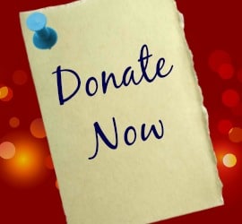 A post-it note with "Donate Now" written on it