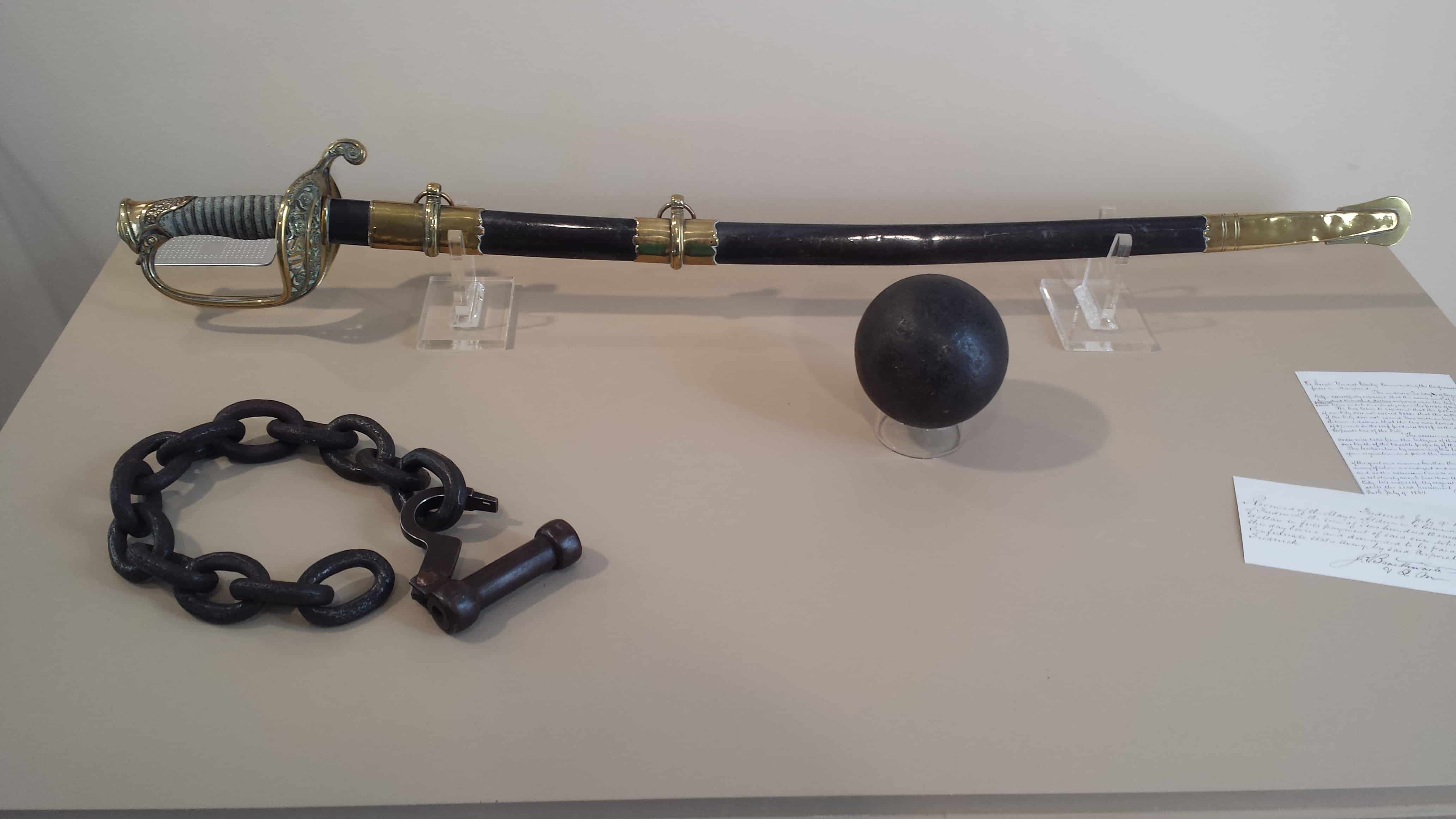 Lew Wallace's sword with a cannon ball from Monocacy and the slave chains struck from Maggie Toogood's neck