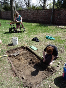 Archaeology workers begin a trench on the Study grounds.