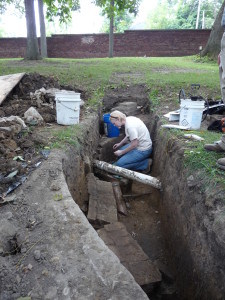 Archaeology in a trench in the reflecting pool