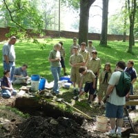Anne Shaw discusses archaeology with a group of listeners