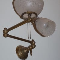 Hybrid gas-electric lamps on a folding arm
