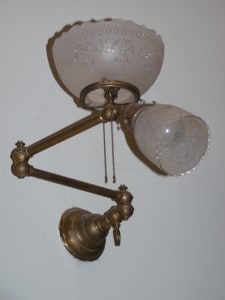 Hybrid gas-electric lamps on a folding arm