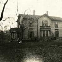Wallace family house viewed from the south. It is a two-story Victorian home with the entrance facing west.