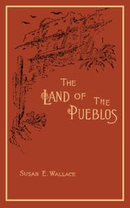 Book cover of Land of the Pueblos by Susan E. Wallace. The cover is orange, with a sketch of a pueblo in black