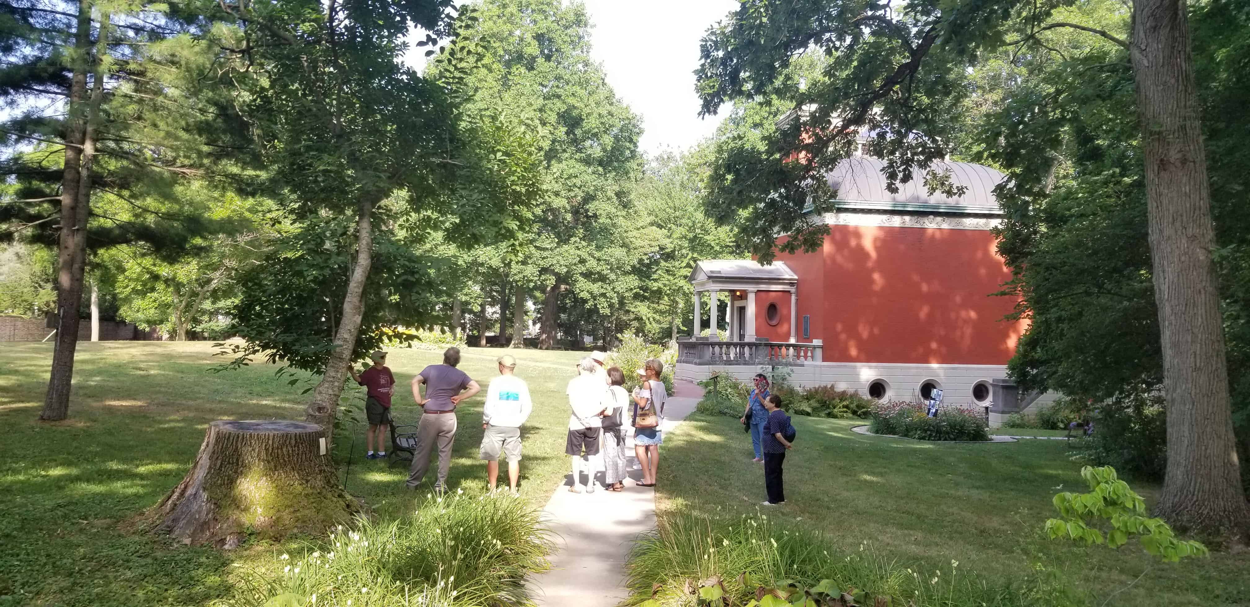 Visitors participate in a Garden Tour of the Study grounds